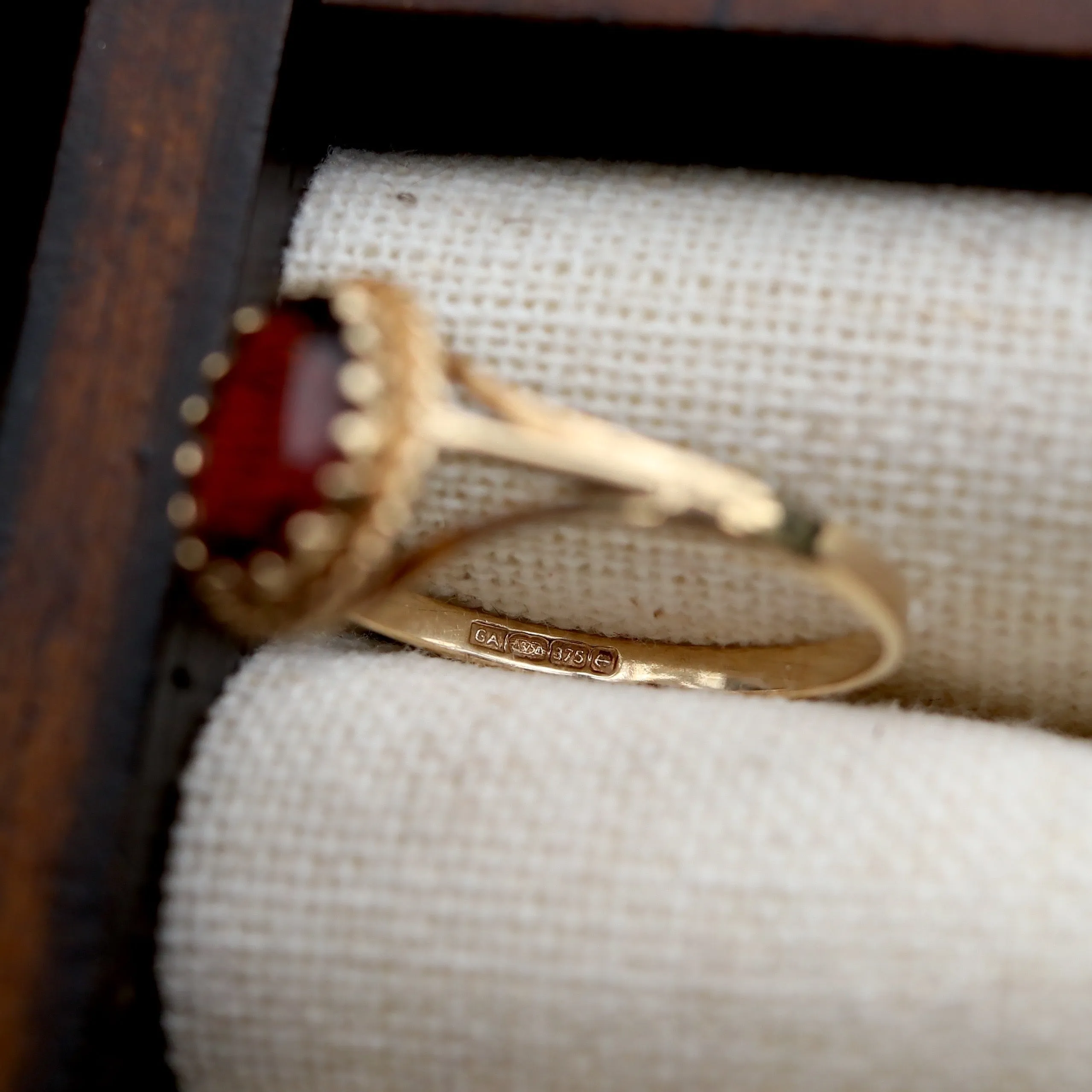 Vintage Primrose Garnet Ring with Intricate Gold Detail