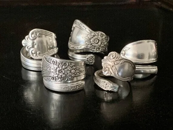 Sure! Heres an optimized product title with modifiers:

Handcrafted Vintage Sterling Silver Spoon Ring - Antique-Inspired Jewelry with Intricate Design